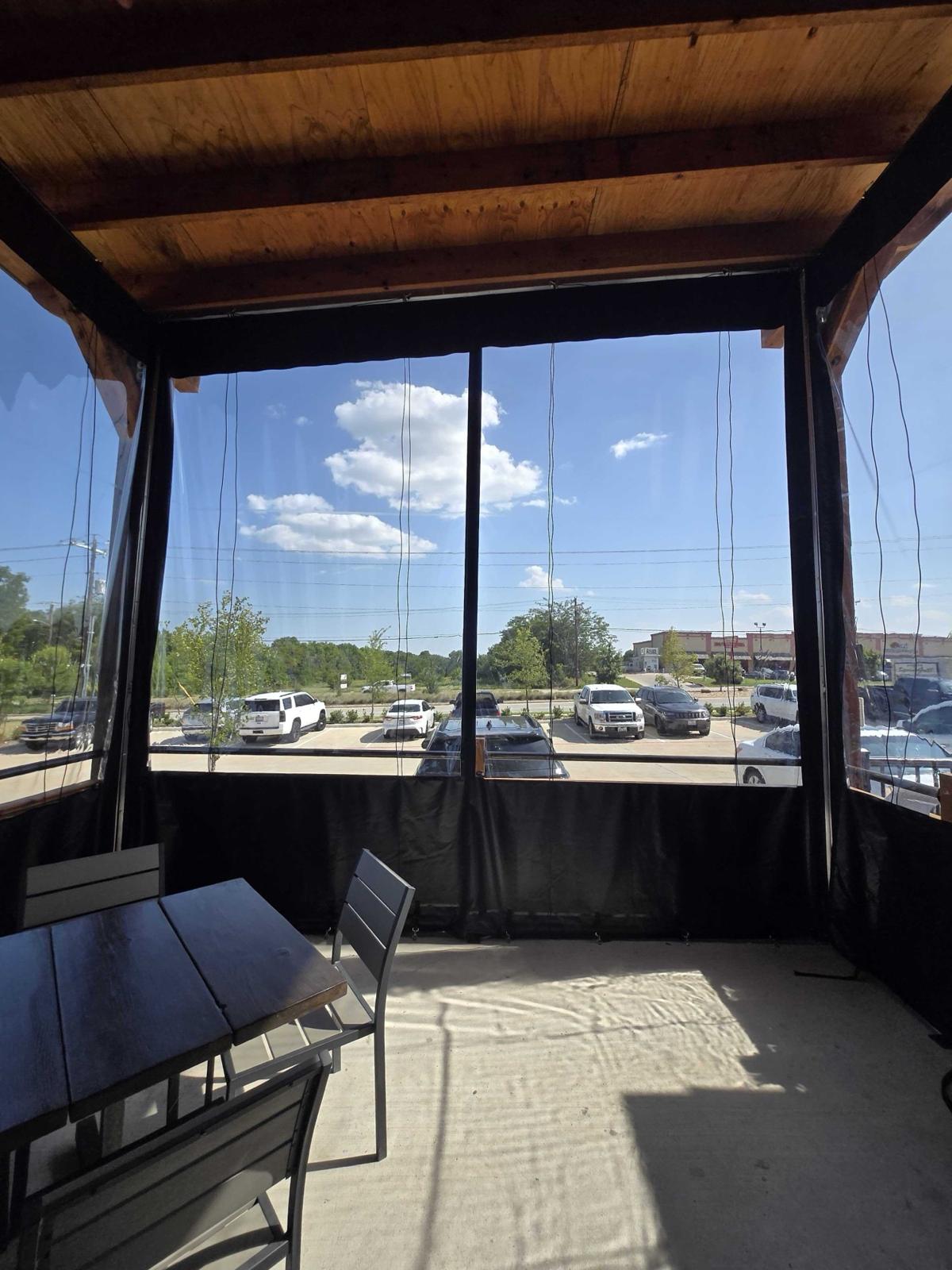 Clear manual roll panels closing in a patio