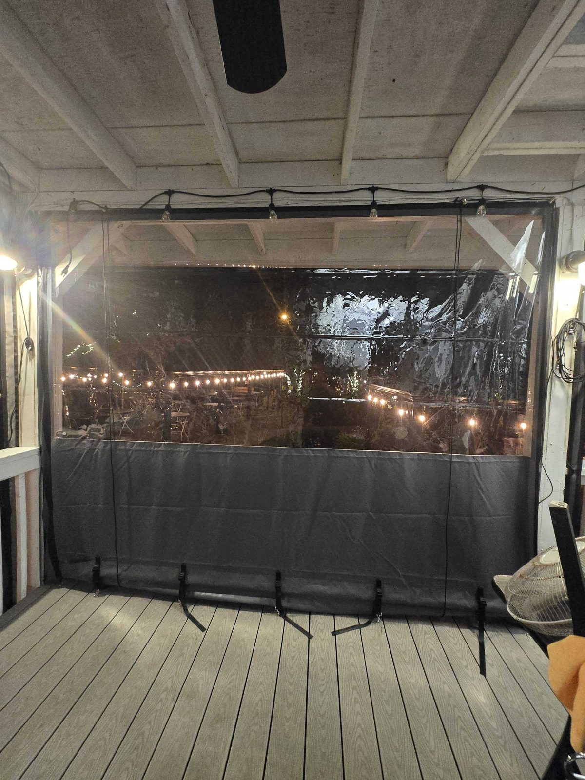 Custom clear vinyl enclosure panel with solid grey base at drink-rail height, The Bee & The Biscuit, Virginia Beach