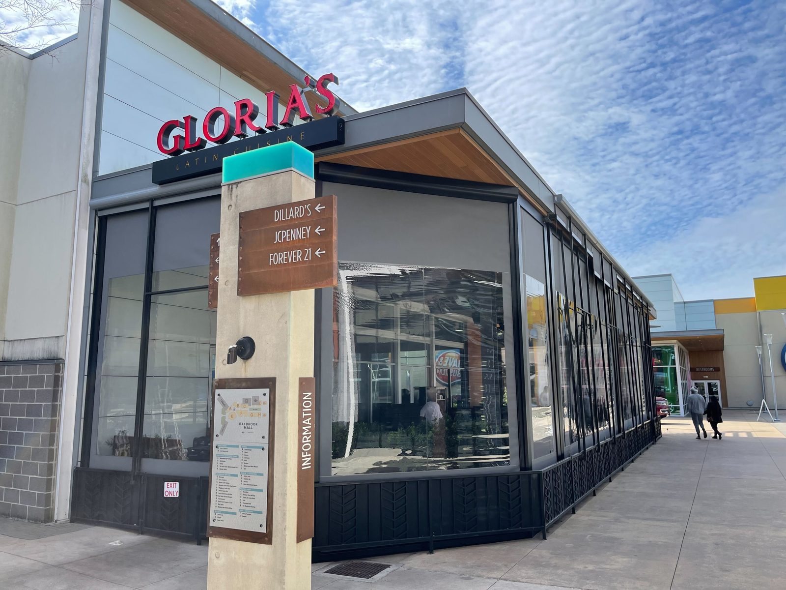 Gloria's Latin Cuisine at Baybrook: the corner patio closed in motorized screens with clear windows, the mall sidewalk in front