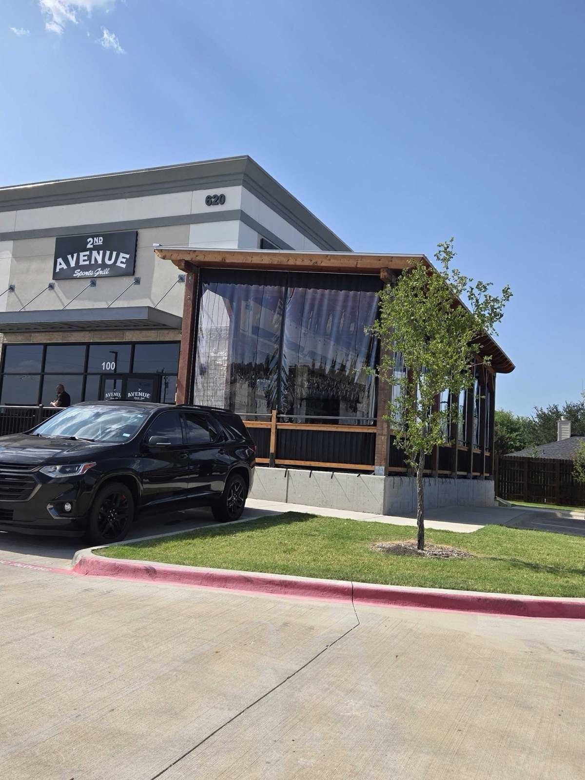 2nd Avenue Sports Grill — manual roll clear vinyl enclosure
