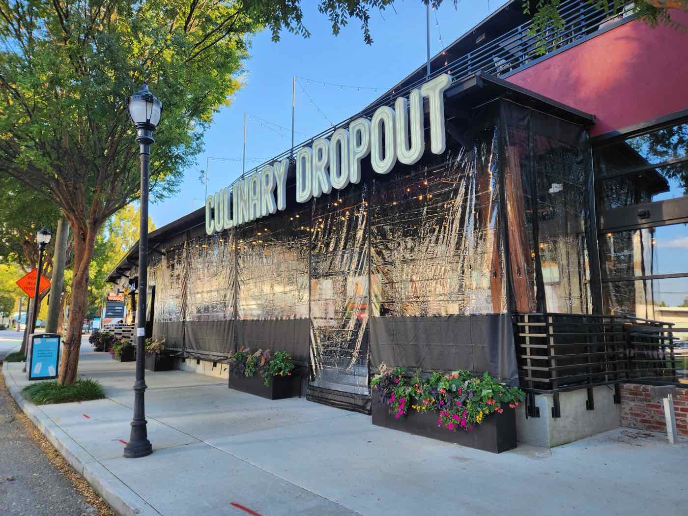 Culinary Dropout, Atlanta GA — full-frontage clear vinyl enclosure