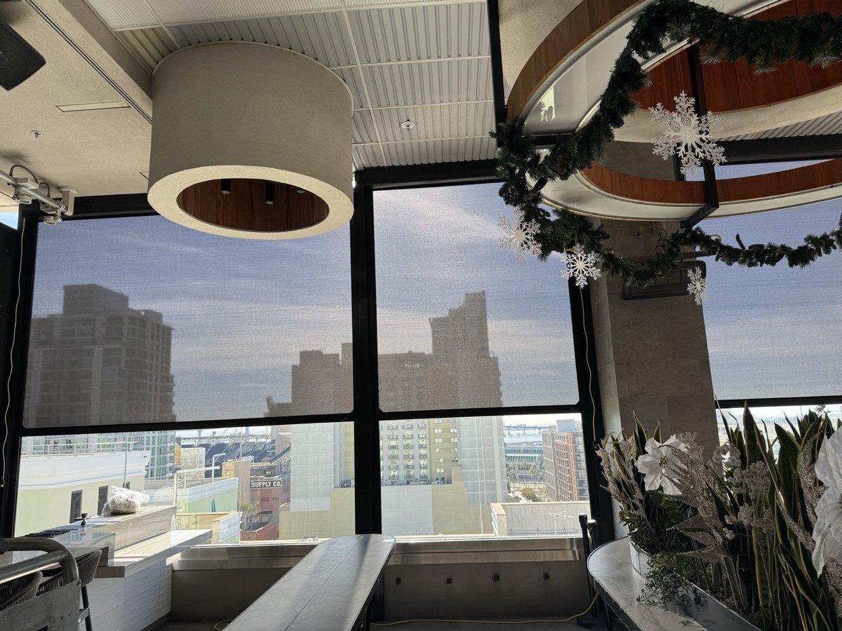 The Nolen, San Diego CA (Marriott) — motorized sun shades with one-way daytime visibility over the skyline