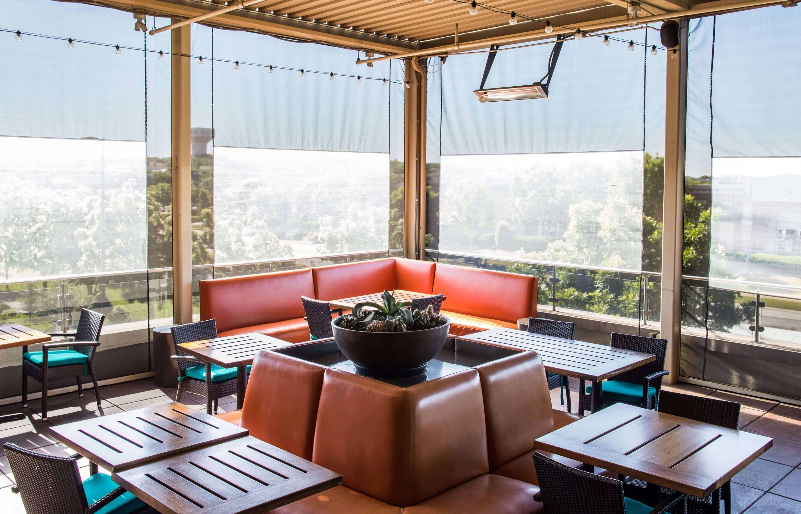 motorized patio screens sun shade material clear vinyl windows rooftop patio del frisco restaurant orange furniture