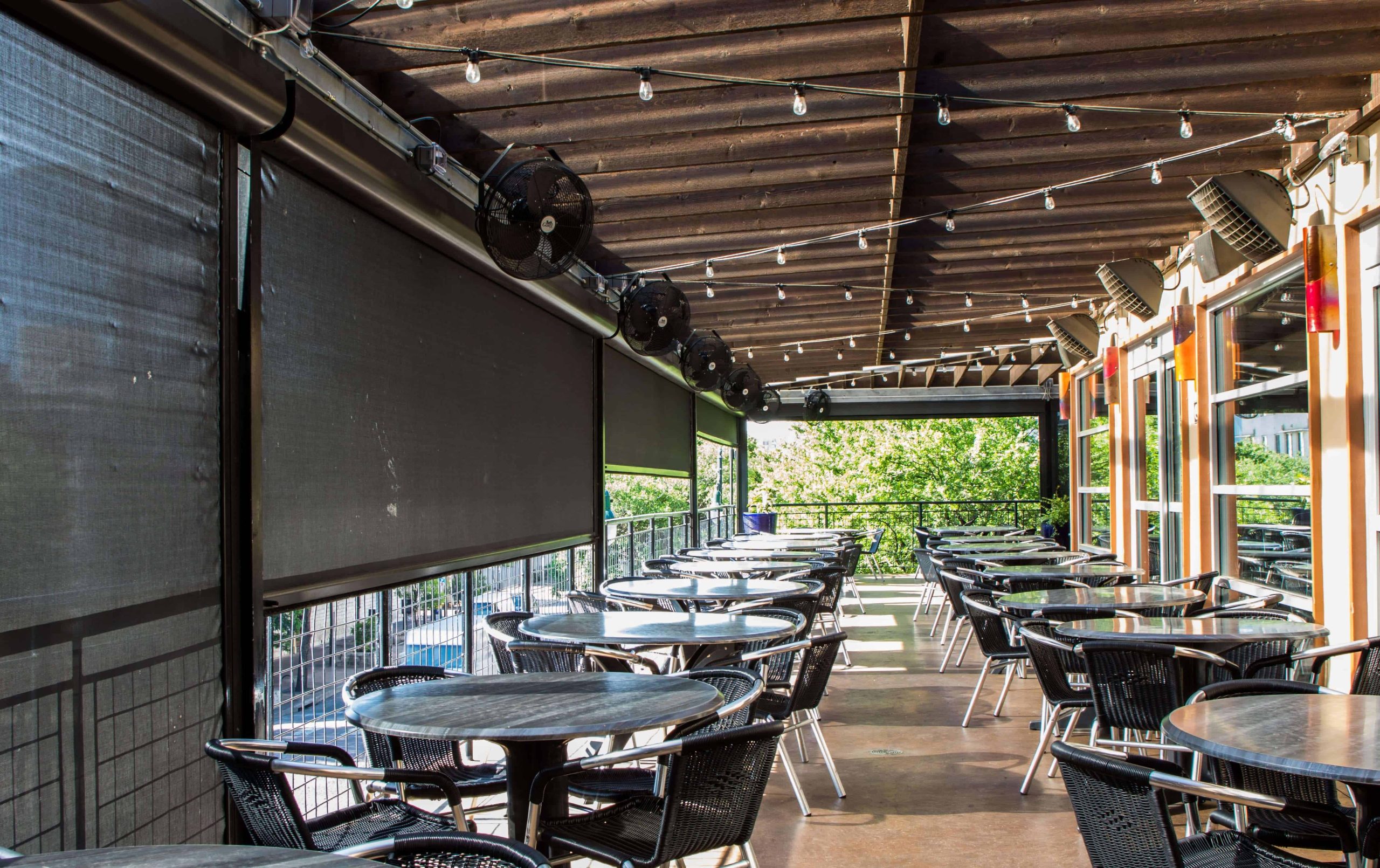 restaurant patio sun sahdes half lowered commercial strength shades
