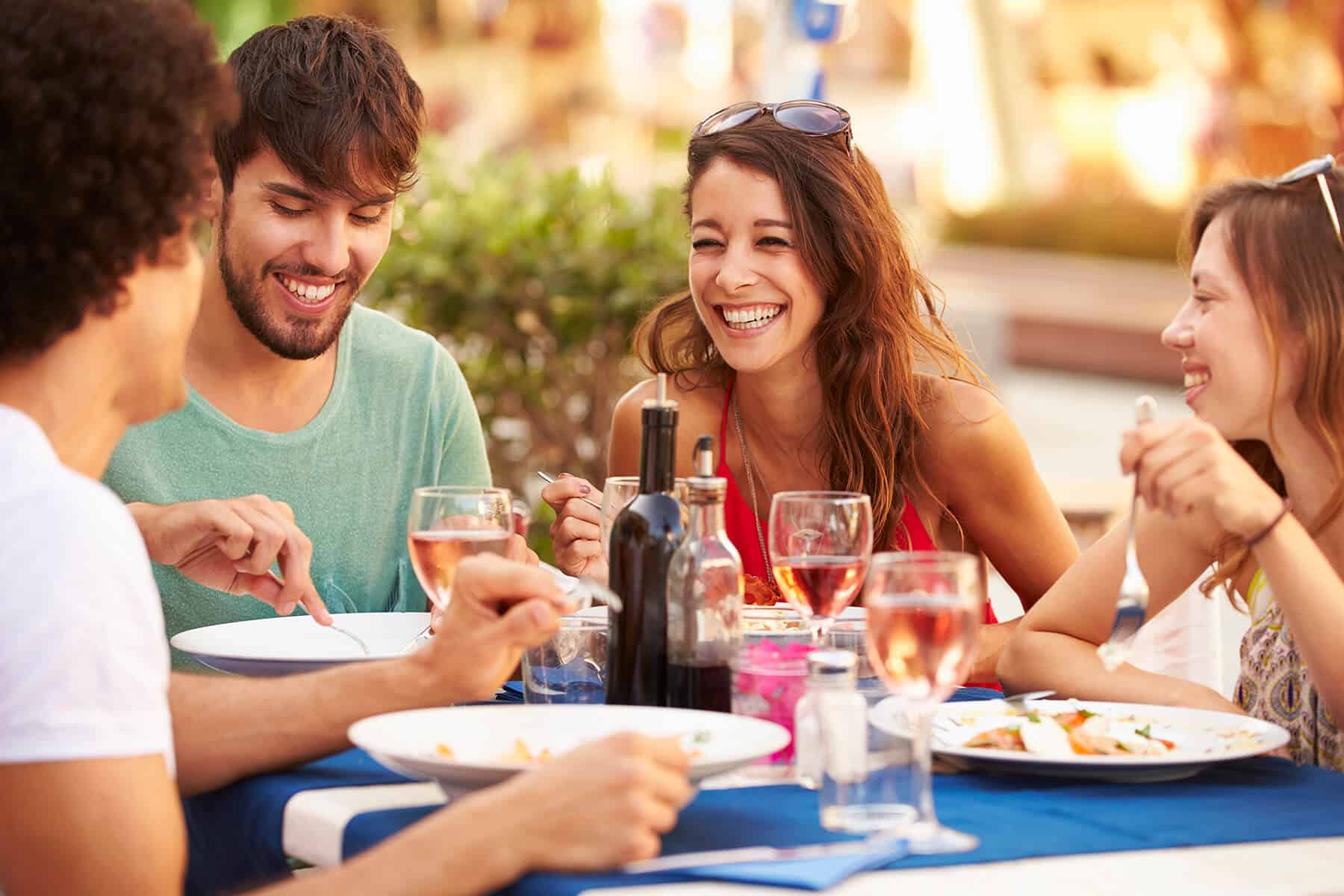 group of friends dining outdoors